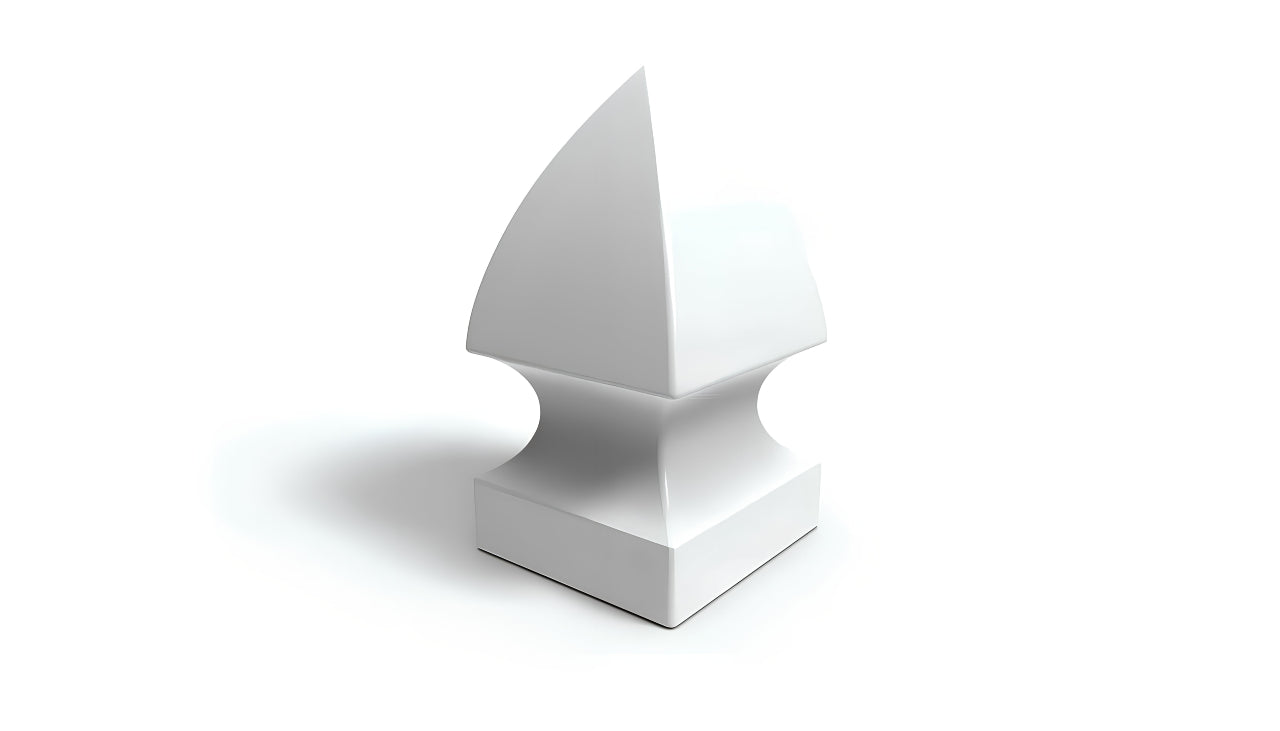 A PVC fence cap with a triangular, gothic shape.